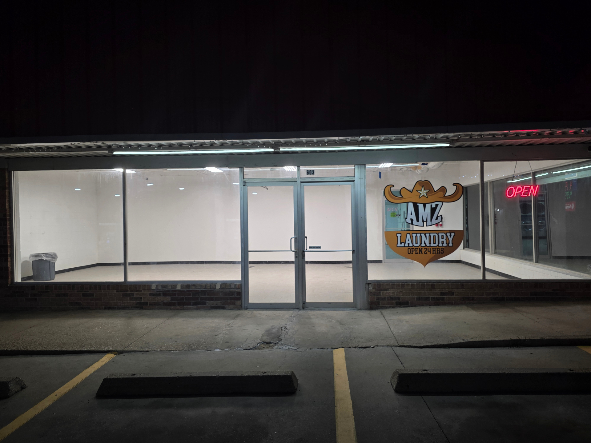 AMZ Laundry storefront — open 24 hours
